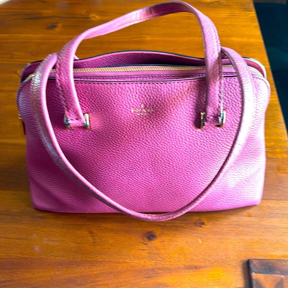 Kate Spade leather purse. Raspberry color. No stains or flaws on leather.